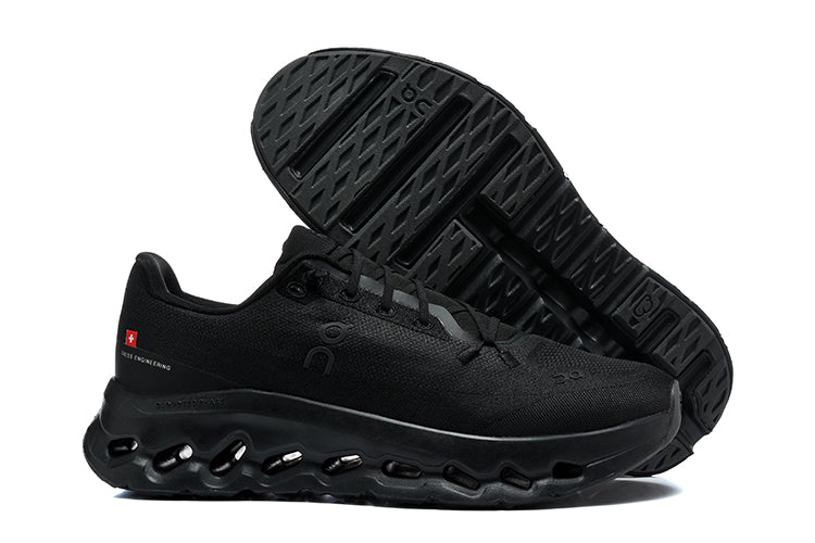 Black On running shoe shown from the side with its sculpted outsole visible.