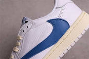 Close-up of the blue side Swoosh and stitched white upper panels.