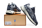 Sneaker pair displayed with a box; box label is not legible