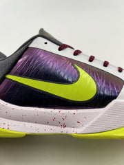 Side detail showing the large volt Swoosh over an iridescent purple panel.