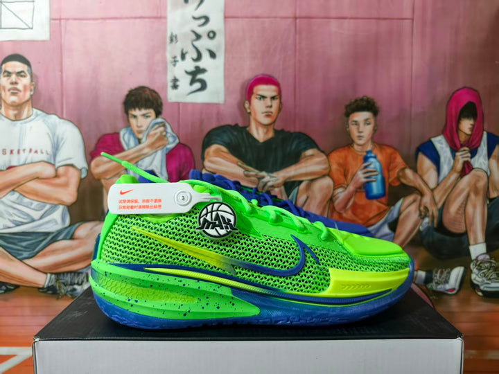 Side view of a Volt green and blue Nike basketball shoe with mesh-look panels and a contrasting Swoosh.