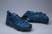 Pair of blue Nike Air VaporMax Plus TN-15 sneakers shown from front and side angles.