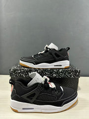 Angled side view highlighting the black side mesh panel, structured side support, white midsole, and gum outsole.