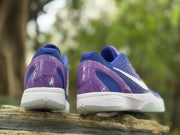 Rear view of the sneakers showing the translucent purple heel sections and Kobe signature-style heel details.