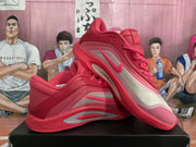 Angled side view showing the pink Nike Swoosh, layered upper, and sculpted sole detailing.