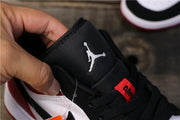Black tongue with a white Jumpman logo and red lace tag.