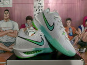 Angled view showing the green Swoosh, perforated side panels, and ZoomX midsole branding.