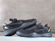 Pair of black Nike Kobe 8 shoes in side and heel views