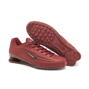 Burgundy Nike Shox Z R2 sneakers with the outsole visible