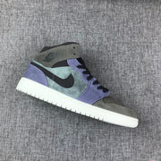 Angled side view of one gray and purple sneaker with a white midsole.