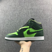 Outer side profile showing the dark green overlays, fluorescent green panels, and black Swoosh detail.