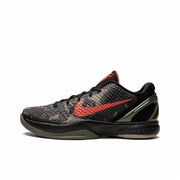 Black Kobe 6 sneaker with a red Swoosh and dark sculpted outsole.