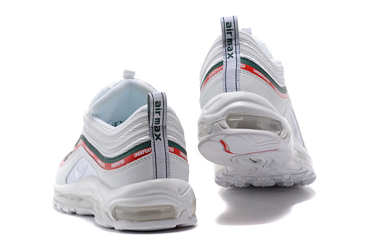 Nike Air Max 97 sneakers shown from the heel, highlighting the layered rear panels and heel cushioning.