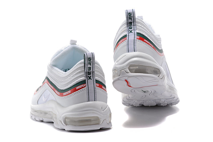 Nike Air Max 97 sneakers shown from the heel, highlighting the layered rear panels and heel cushioning.