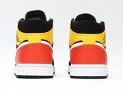 Rear view showing yellow ankle panels, red-orange heel panels, and black collars