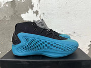Side view of a black and blue adidas high-top shoe with sculpted side detailing