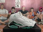 Side profile of a white high-top sneaker with perforated panels, green outsole accents and black trim.