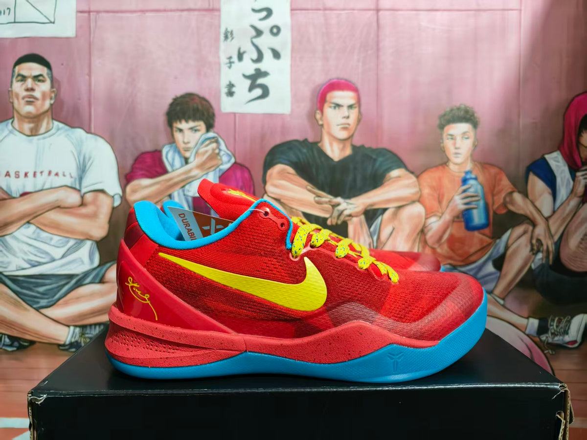 Pair of red Nike basketball sneakers with yellow Swooshes and laces, blue accents, and a basketball-themed background.