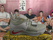 Side view of one gray Nike basketball sneaker showing the textured upper, patterned panel, red swoosh detail, and outsole.