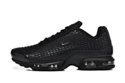 Side view of a black Nike Air Max Plus VII sneaker
