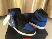 Angled view showing the blue toe boxes, black panels, blue collars and Air Jordan-style ankle branding.