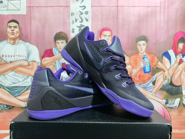 Pair of black and purple Nike basketball sneakers shown from a three-quarter angle on a shoe box.