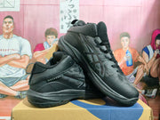 Black ASICS Gelhoop basketball shoes displayed together at an angle.