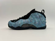 Black high-top sneaker with an iridescent blue-toned side panel.