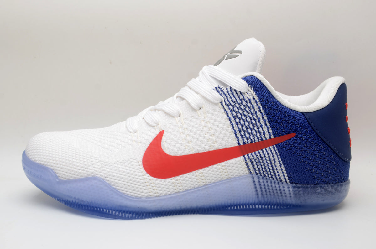 Side view of white Nike Kobe 11 shoes with blue panels, red side logo, and translucent blue outsole.