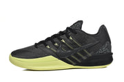 Side profile of a black Kobe basketball shoe with gray accents and a volt-colored midsole section.
