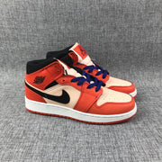 Pair of sneakers shown from a front three-quarter angle with blue laces and black collars.