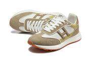 Pair of color-blocked low-top sneakers shown at an angle