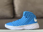 Single blue high-top sneaker shown in profile with a white side logo and white outsole.