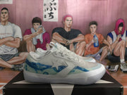 Side profile of a white sneaker with a blue patterned panel and star-and-chevron logo.