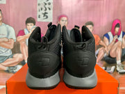 Rear view of black and grey Nike basketball sneakers showing padded collars, black heel panels and grey midsoles.
