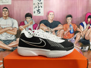 Side view of a white and black Nike basketball shoe showing the patterned side panel.