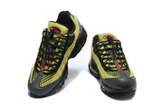 Front view of a pair of green Nike Air Max 95 TT sneakers with black mesh-style panels