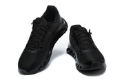 Pair of black On running shoes shown from the front.