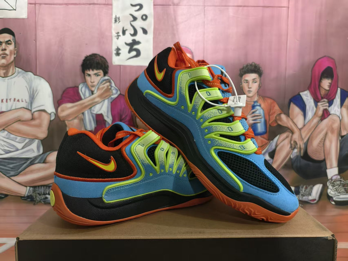 Blue, green, orange, and black Nike sneakers shown from the side on a display box.