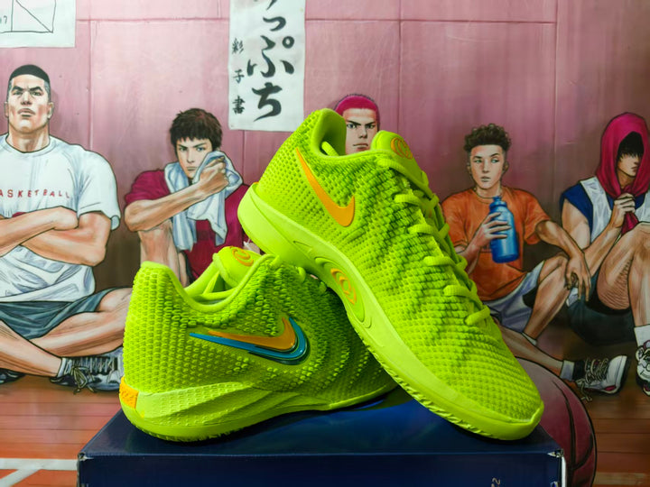 Pair of volt green Nike basketball shoes shown at an angle, with multicolor side swoosh details.