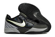 Black Nike Ja 2 shoe with a bright side logo beside the patterned outsole