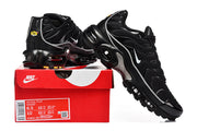 Black Nike Air Max Plus sneakers displayed with a box labeled Air Max Plus, HV0666-002, and size information.