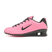 Side profile of pink and black Nike Shox Z R2 sneakers
