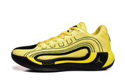 Side profile of a yellow and black basketball sneaker with layered black detailing, padded collar, and visible Jumpman branding.