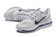 Light grey Nike Pegasus Premium shoes viewed from above and at an angle
