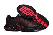 Black and red sneakers shown from the side and outsole