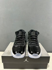 Front view of the pair showing the high-top collars, black laces, and glossy black toe sections.