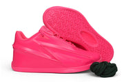 Side profile and patterned outsole of a vivid pink Nike KD 19 basketball shoe.