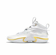 Side view of a white Jordan Air Jordan 36 basketball sneaker with yellow accents.