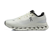 Side profile of a white On Cloudmonster 3 sneaker with a sculpted sole.